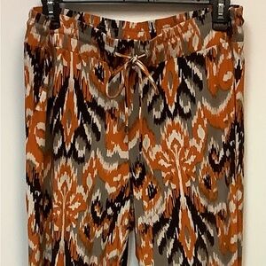 INC women’s pant, size L, orange, dark brown, cream color
